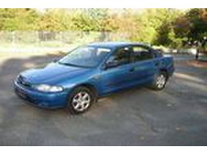 Отзыв Mazda 323 1997