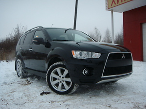 Отзыв Mitsubishi Outlander XL 2011